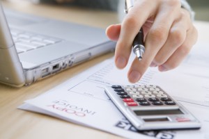 person using a calculator 